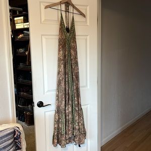 Boho silk halter dress w ruffle hem.